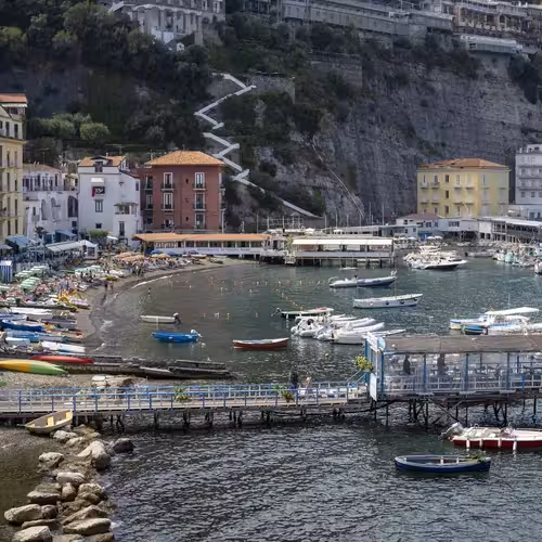Fishing boats and the small beach of Marina Grande below the cliffs of Sorrento