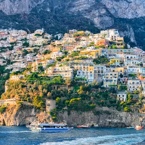 The houses of Positano climbing the cliff above the sea on the Amalfi Coast