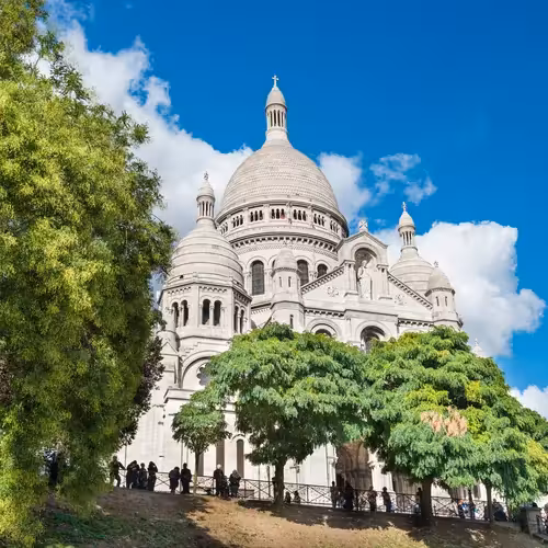 The white domes of the Sacré-Cœur basilica on the hill of Montmartre
