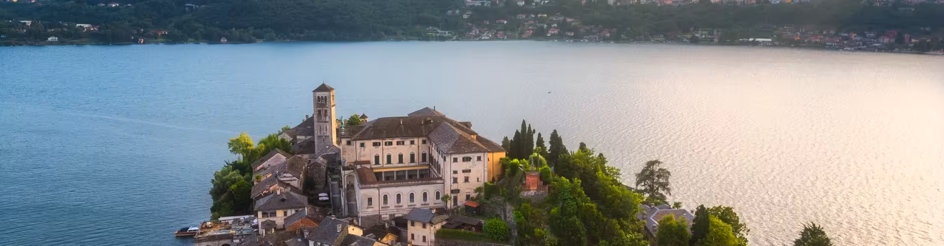 Aerial view of San Giulio island on Lake Orta, Province of Novara, Italy.