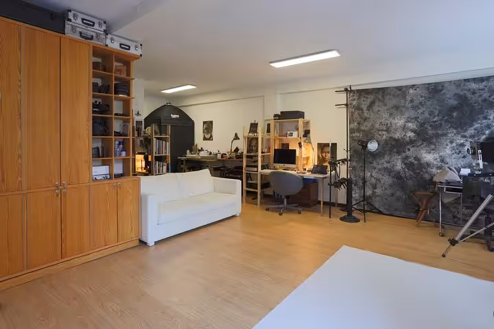 Porto studio set for 19th century metal portrait tour, with backdrops, lights and vintage photography gear