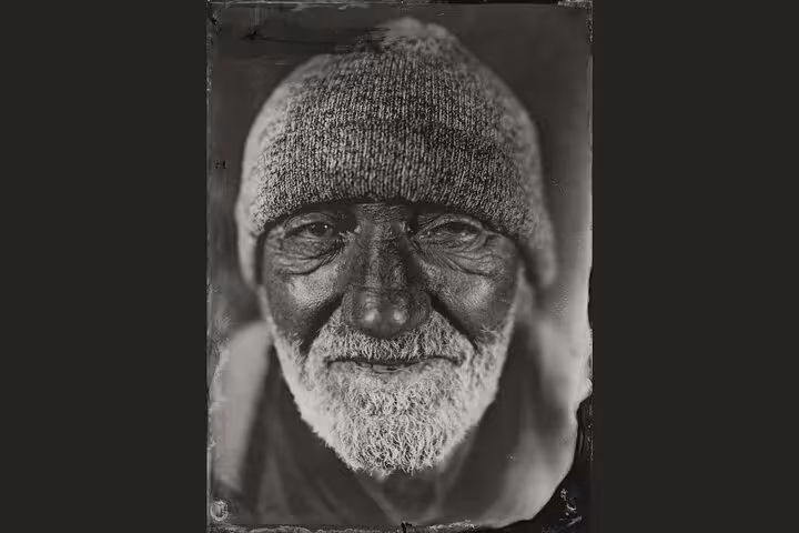 Close-up 19th-century metal plate portrait of an elderly man, classic tintype photo session in Porto, Portugal