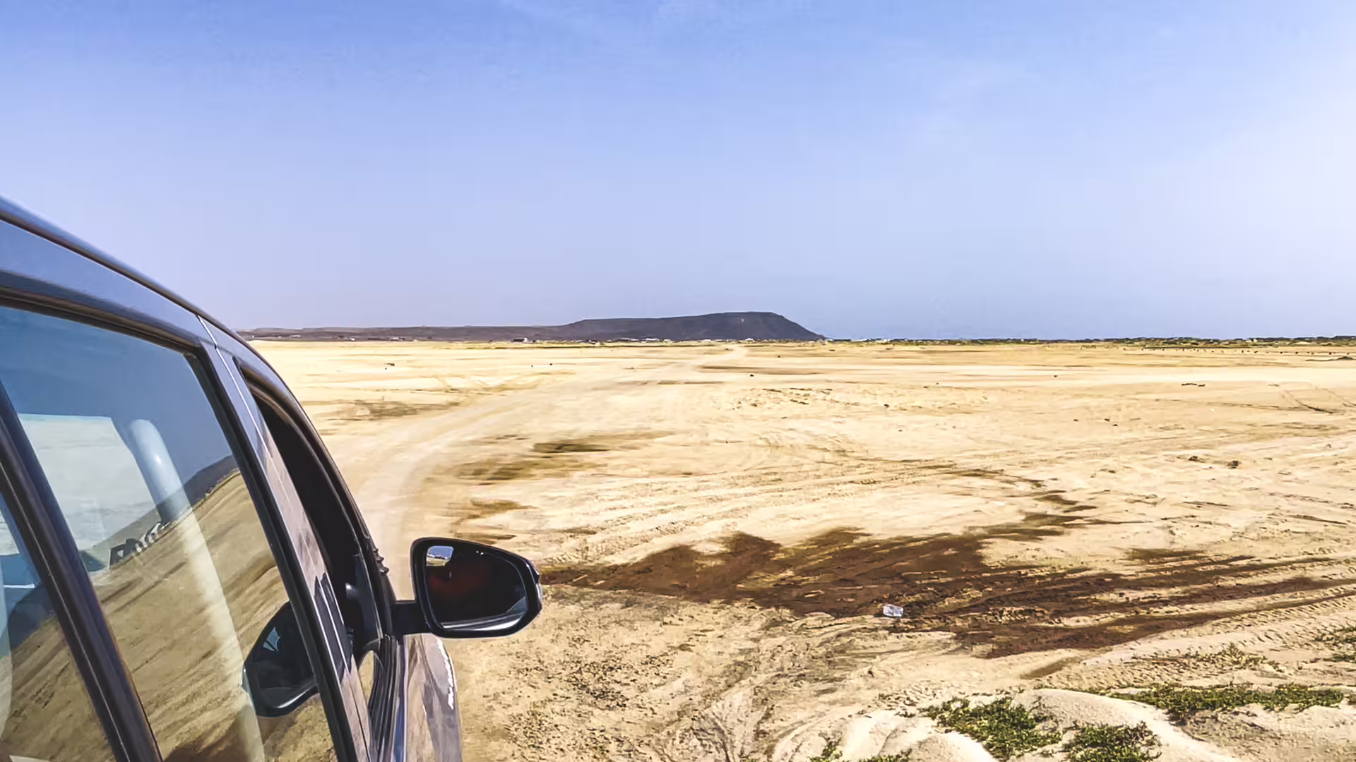 4x4 driving across Sal Island desert landscape, Cabo Verde, part of full-day all-inclusive island tour