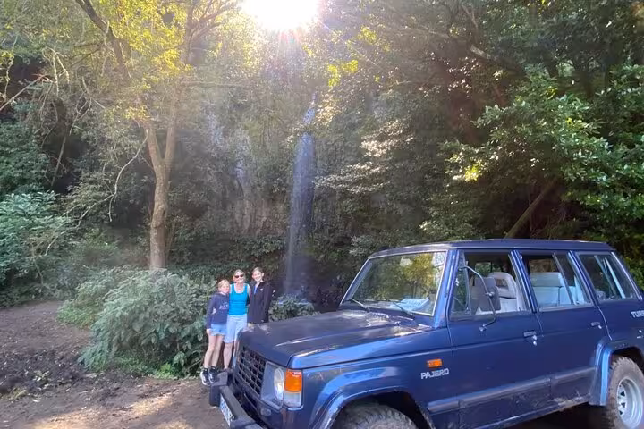 4x4 jeep stop at Madeira forest waterfall on Pico do Areeiro to Ponta São Lourenço expedition