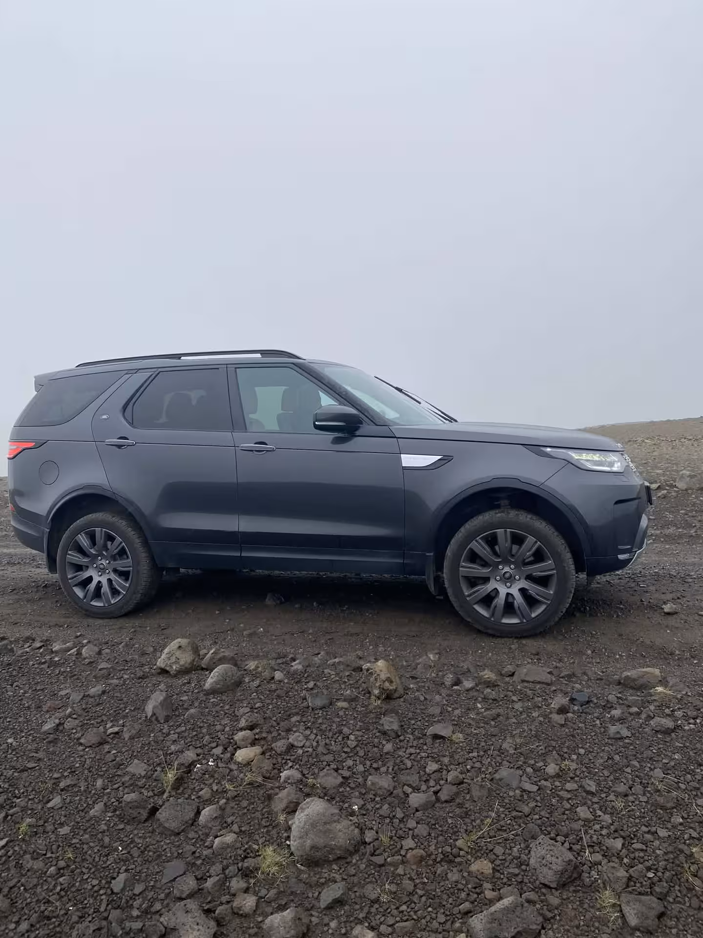 4x4 SUV on rugged volcanic gravel, private Grand Golden Circle tour from Reykjavik in Iceland