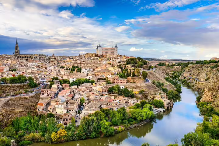 Stunning panoramic view of Toledo Spain showing Alcazar fortress cathedral and Tagus River on guided tour