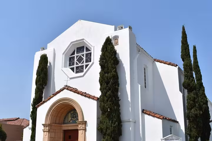 Historic white chapel with Spanish Colonial architecture at Liberty Station San Diego self-guided walking tour landmark