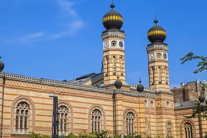 Budapest self-guided walking tour stops at the iconic Dohány Street Synagogue with ornate Moorish twin towers