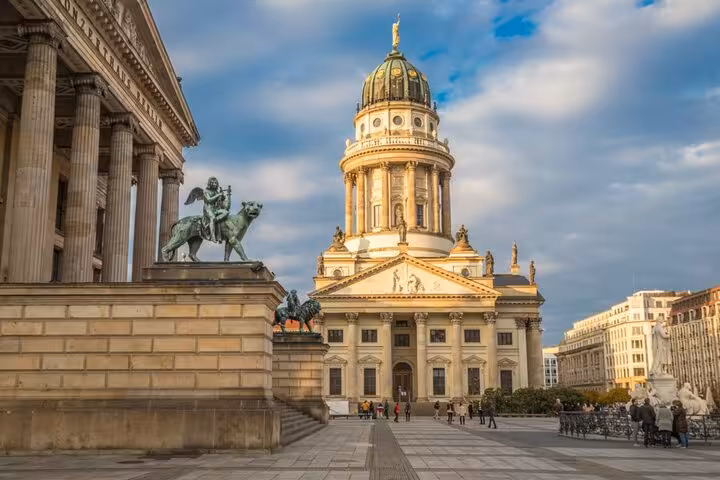 Stunning view of Gendarmenmarkt with the French Cathedral during a Berlin WW2 self-guided walking tour.