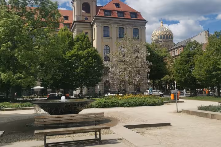 Berlin park fountain near the New Synagogue, a notable landmark on a self-guided WW2 smartphone walking tour.