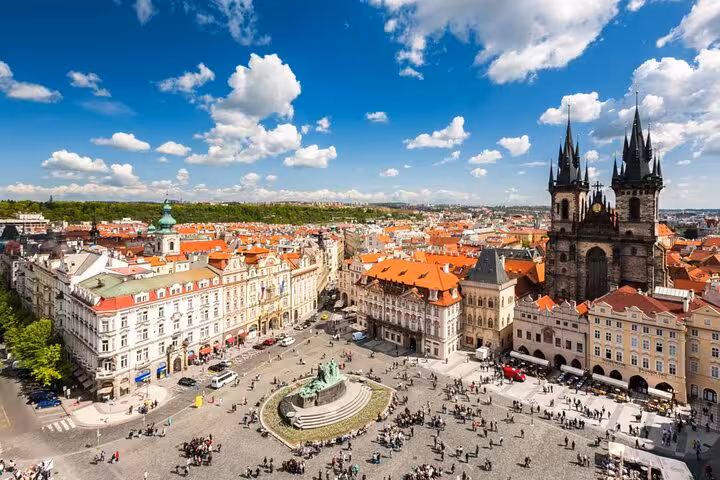 Aerial view of Prague Old Town Square with Church of Our Lady before Týn on a sunny self-guided walking tour