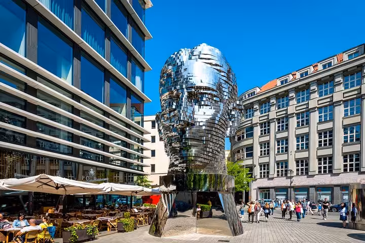 Prague self-guided walking tour landmark featuring the iconic rotating Franz Kafka silver head sculpture downtown
