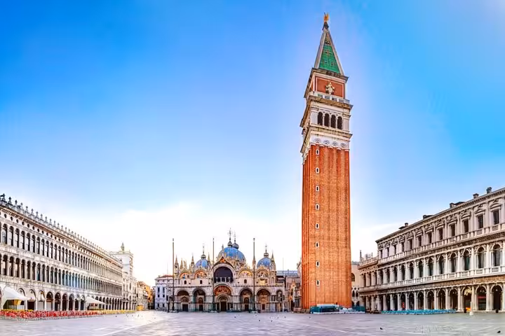 Iconic St Marks Square with Campanile bell tower featured in Venice Casanova self-guided romance walking tour