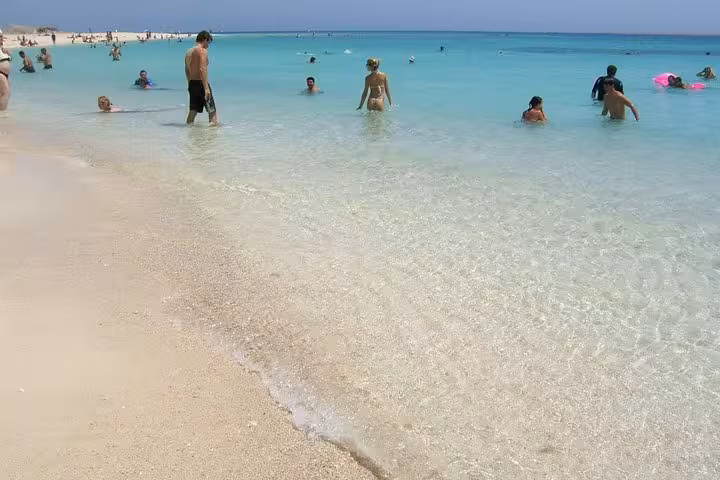 Shallow turquoise lagoon at Abu Dabab Bay National Park, ideal for Hurghada swim with turtles trip