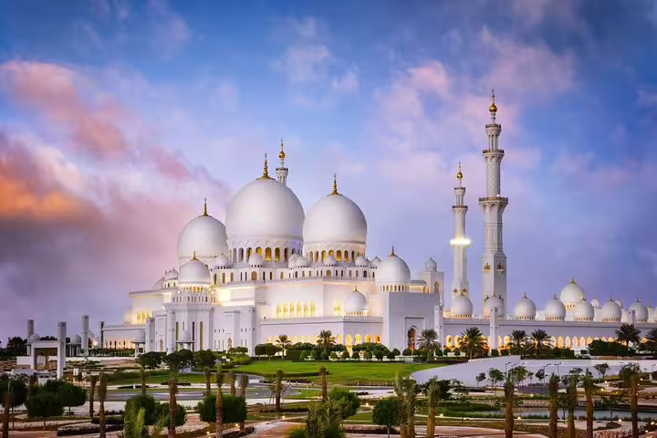 Explore the stunning Sheikh Zayed Grand Mosque at sunset on an Abu Dhabi city tour from Dubai in a 4x4 vehicle.