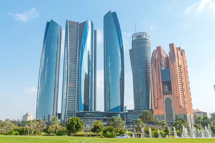 Abu Dhabi skyline with Etihad Towers on Dubai to Abu Dhabi private day tour, modern waterfront view