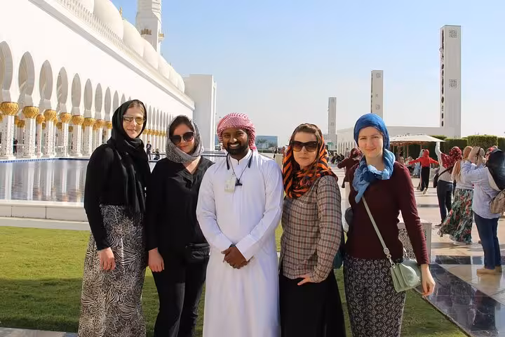 Tour group at Sheikh Zayed Grand Mosque Abu Dhabi, guided day trip from Ras Al Khaimah with photo stop