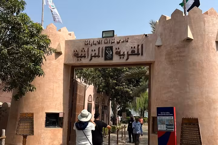 Entrance to Heritage Village Abu Dhabi, traditional souk-style stop on Abu Dhabi city tour cultural visit