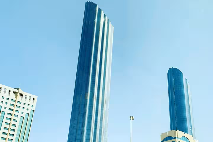 Stunning glass skyscrapers dominating the Abu Dhabi skyline on a full-day city sightseeing tour