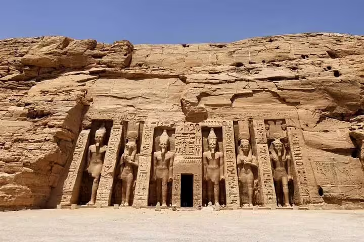 Abu Simbel Small Temple of Nefertari facade carved in sandstone cliff, popular day tour from Aswan