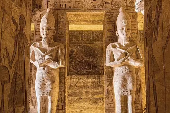 Interior statues and hieroglyphs at Abu Simbel temples, a must-see stop on an Aswan day tour