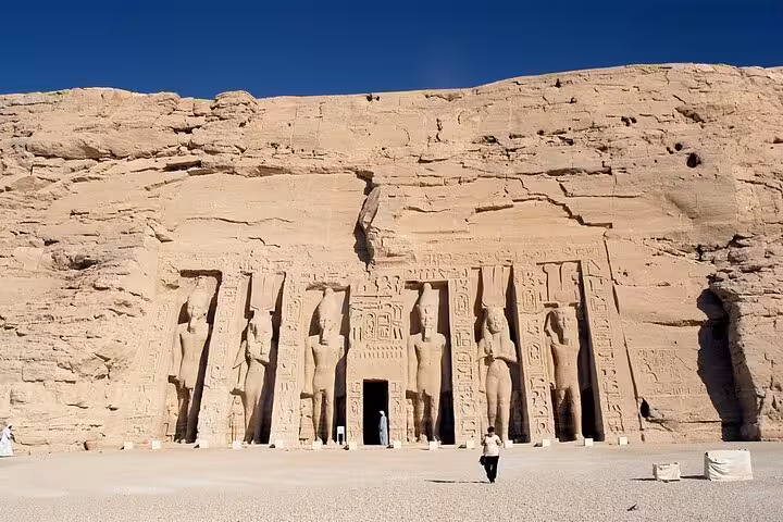 Abu Simbel Great Temple facade with colossal statues, highlight of private day tour from Luxor to Aswan
