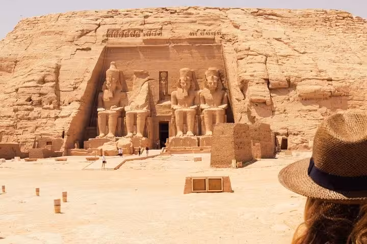 Wide view of Abu Simbel temples in the desert, visited on a private Aswan day tour with pickup