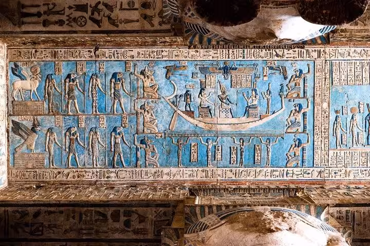 Colorful Abydos Temple ceiling reliefs and hieroglyphs, must-see on private Dendara and Abydos tour