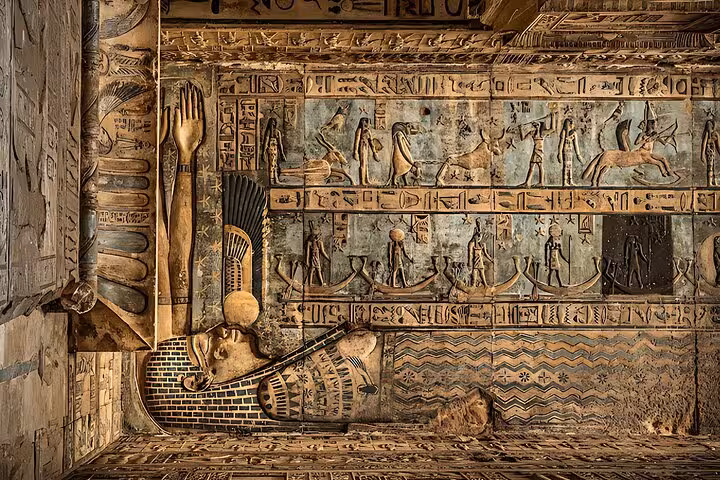 Ancient Egyptian wall reliefs at Abydos Temple, detailed hieroglyphs on full-day tour from Hurghada