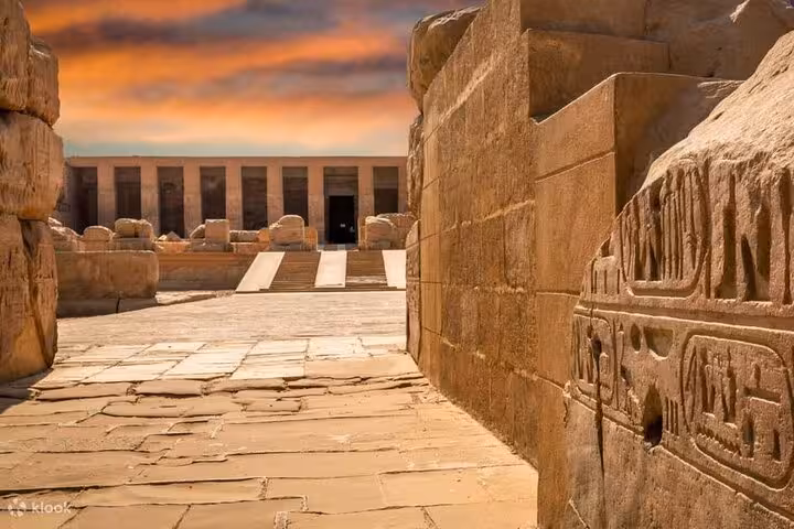 Ancient stone corridor with hieroglyphs at Abydos Temple of Seti I, Egypt, on a private day tour from Luxor