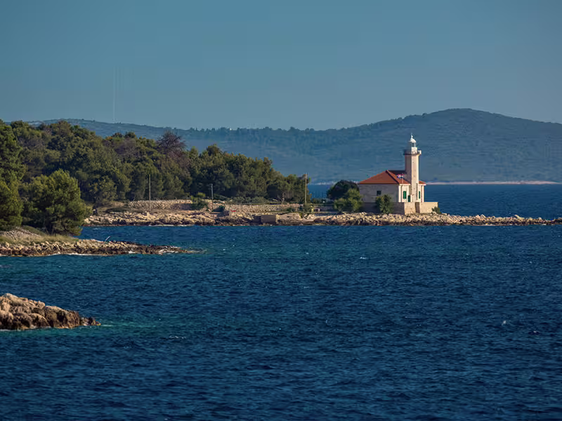 Coastal lighthouse on the Adriatic near Hvar and Brac, scenic stop on a private boat tour to Pakleni Islands