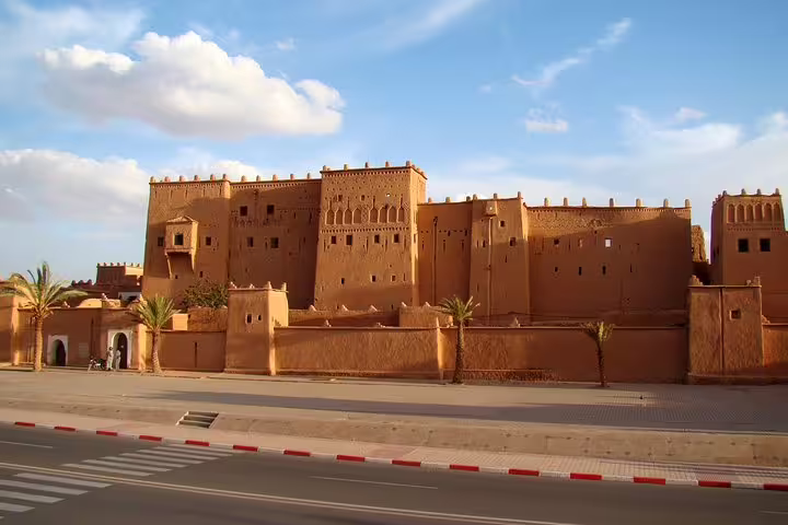 Ait Benhaddou kasbah near Ouarzazate at sunset, iconic stop on 8-day desert tour from Marrakech