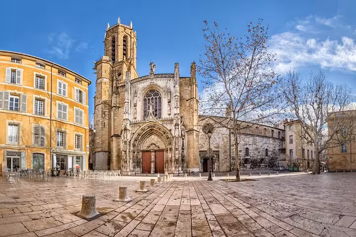 Gothic facade of Saint-Sauveur Cathedral on a sunny plaza in Aix-en-Provence, France