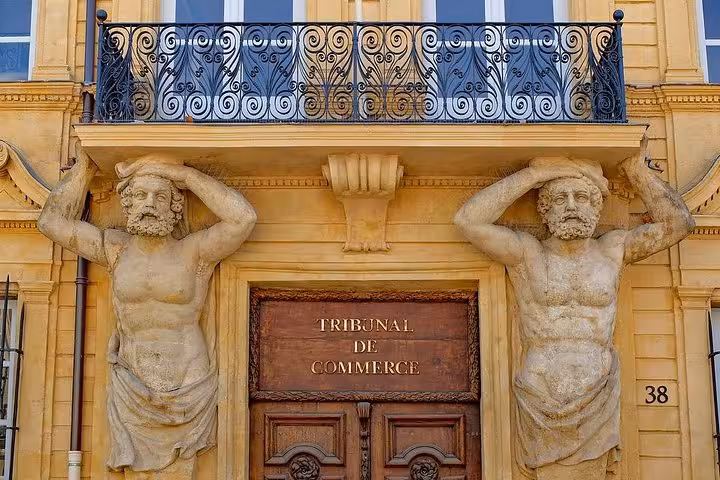 Aix-en-Provence Tribunal de Commerce facade with stone atlantes, historic stop on Cézanne wine tour