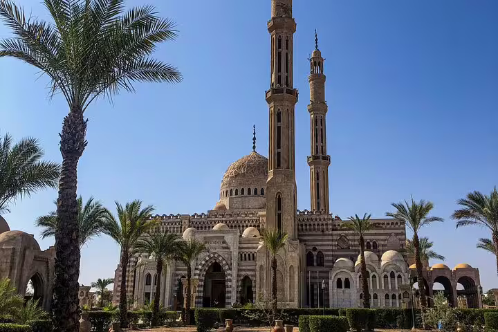 Al Mustafa Mosque in Sharm El Sheikh with twin minarets and palm gardens on a city tour in Egypt