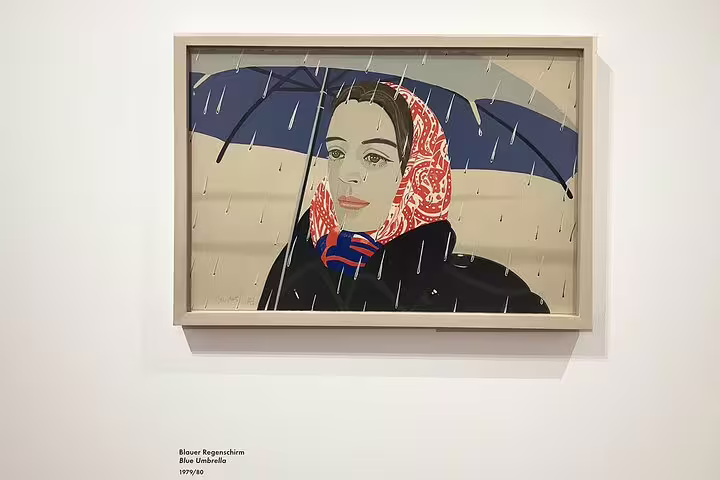 Stylish portrait of a woman with a blue umbrella, featured in Albertina Art Museum's exclusive masterpieces tour.