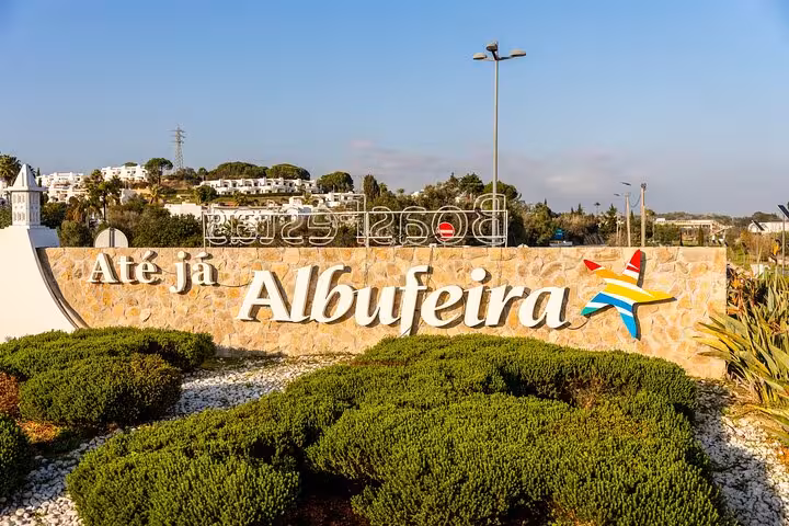 Welcome sign at the entrance of Albufeira, inviting visitors to explore the city on a private guided walking tour.