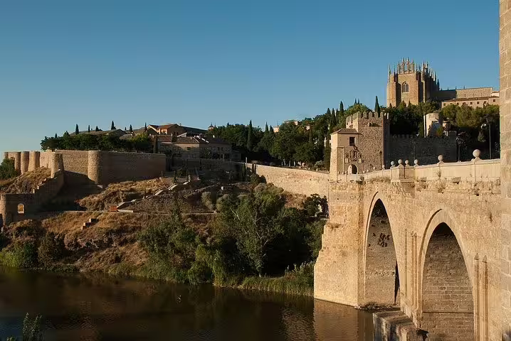 Alcántara Bridge over the Tagus River in Toledo, a highlight on a private day tour from Madrid