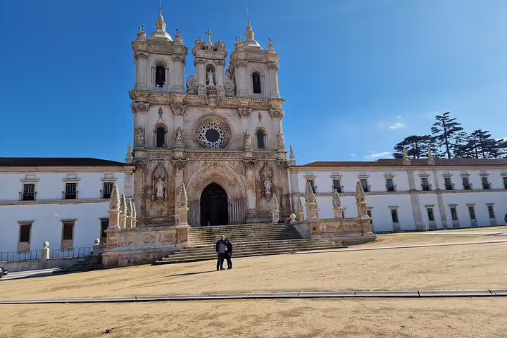 Explore the stunning architecture of Alcobaça Monastery on the Fatima, Nazare, and Obidos full-day private tour from Lisbon.