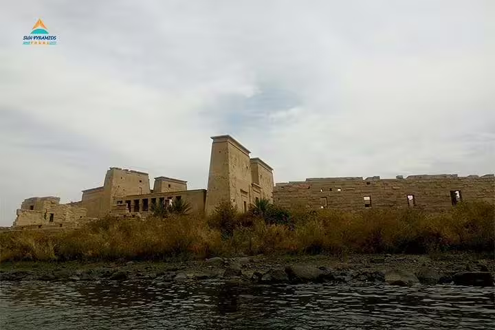Scenic Nile River view of Philae Temple ruins in Aswan on an accessible Alexandria to Abu Simbel tour