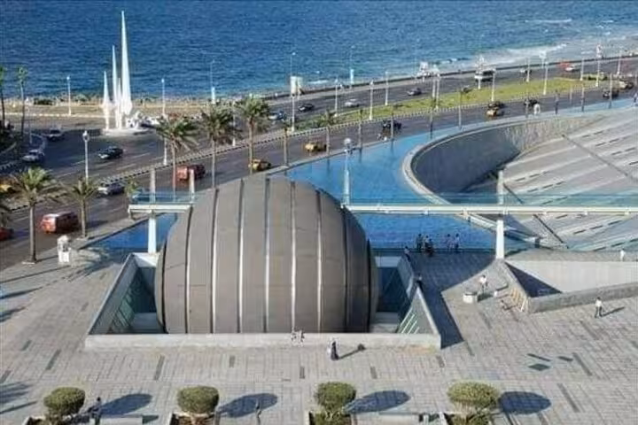 Alexandria Bibliotheca dome and Corniche waterfront, a top stop on Cairo to Alexandria day tour with guide