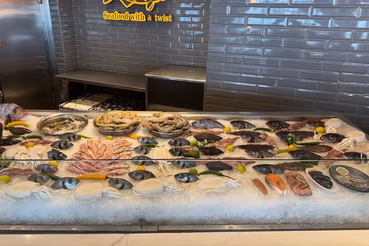 Seafood lunch on Alexandria private VIP tour, fresh fish and shellfish display on ice at local market