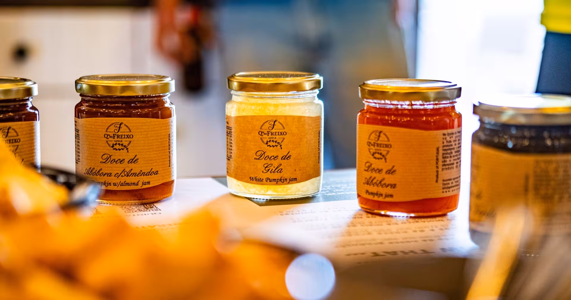 Artisanal Algarve pumpkin jams displayed at a countryside tasting on a full day quad biking tour experience