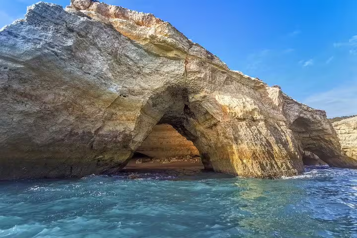 Scenic view of Algarve's stunning sea cave formations during a private two-day tour from Lisbon, showcasing natural beauty.