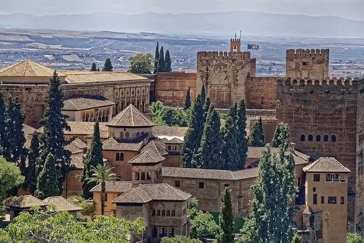 Aerial view of Alhambra's historic architecture, a must-see on the Andalusia and Madrid tour from Lisbon.