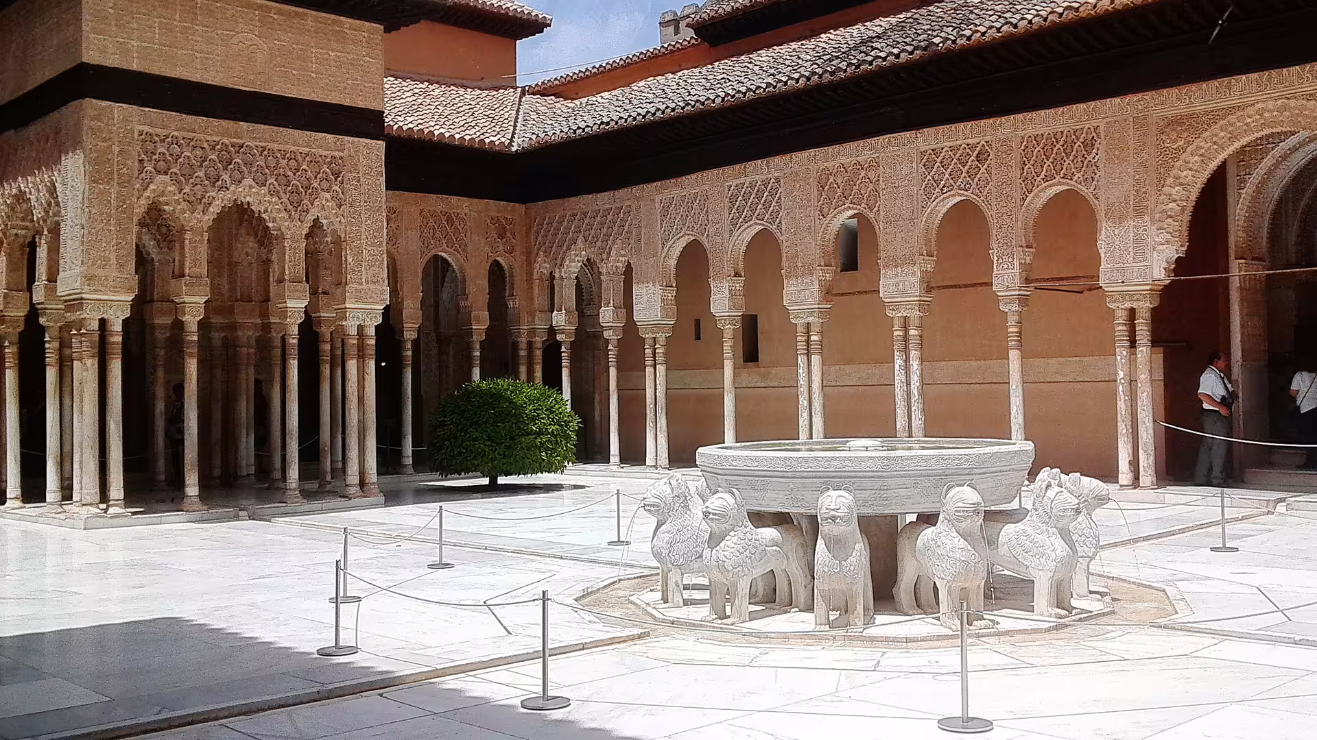 Court of the Lions fountain at Alhambra Palace in Granada, must-see stop on a private tour from Costa del Sol