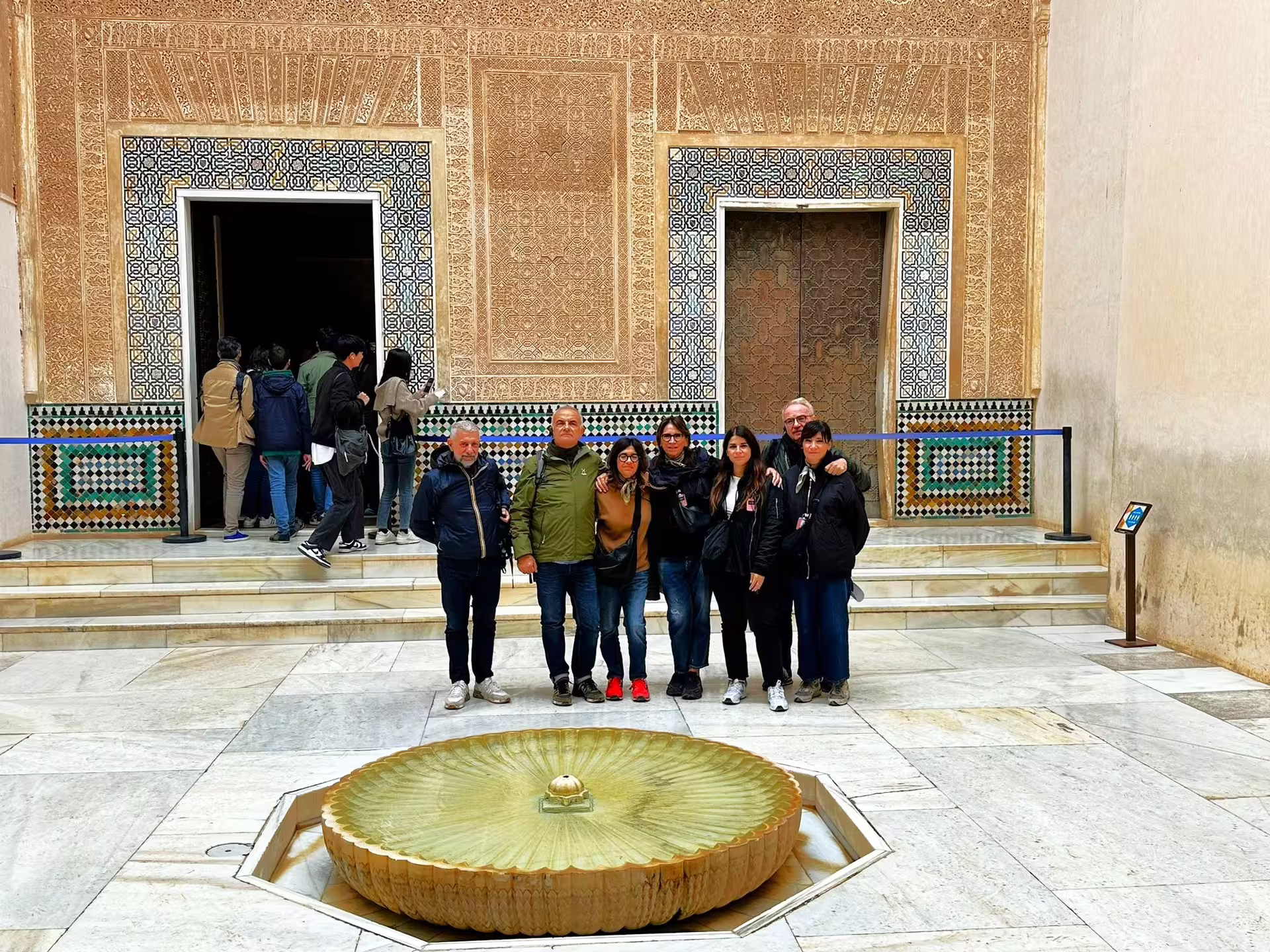 Private Alhambra tour group in Nasrid Palace courtyard by fountain, Granada with hotel pick-up