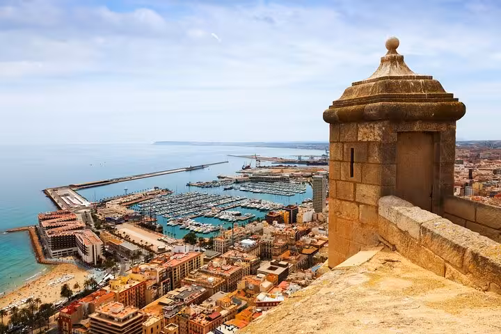 Scenic view from Santa Bárbara Castle in Alicante overlooking the marina and cityscape, ideal for a private city walk tour.