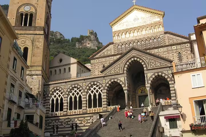 Amalfi Cathedral Duomo di Sant’Andrea facade and grand steps, highlight on Amalfi Coast tour from Naples