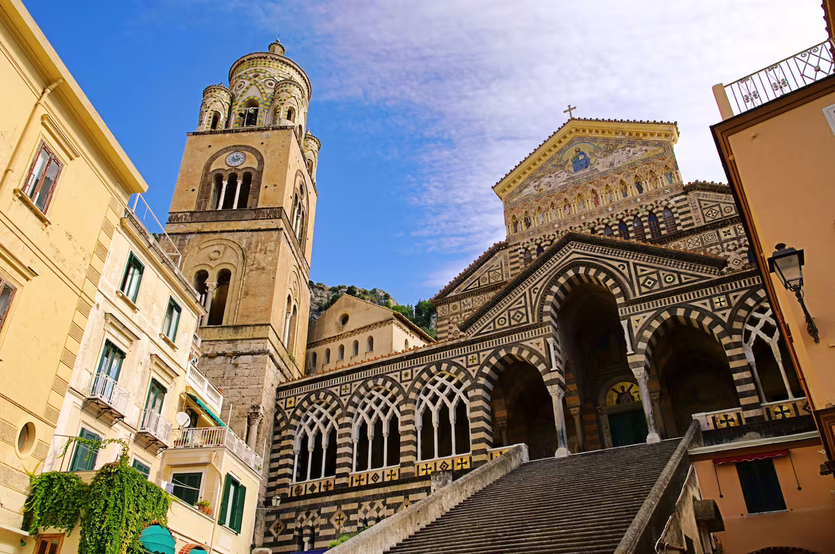 Majestic facade of Amalfi Cathedral with intricate design, a highlight of Positano and Amalfi tours.